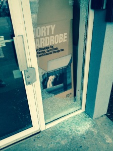 The front door with the super secure cardboard and glass still falling. 